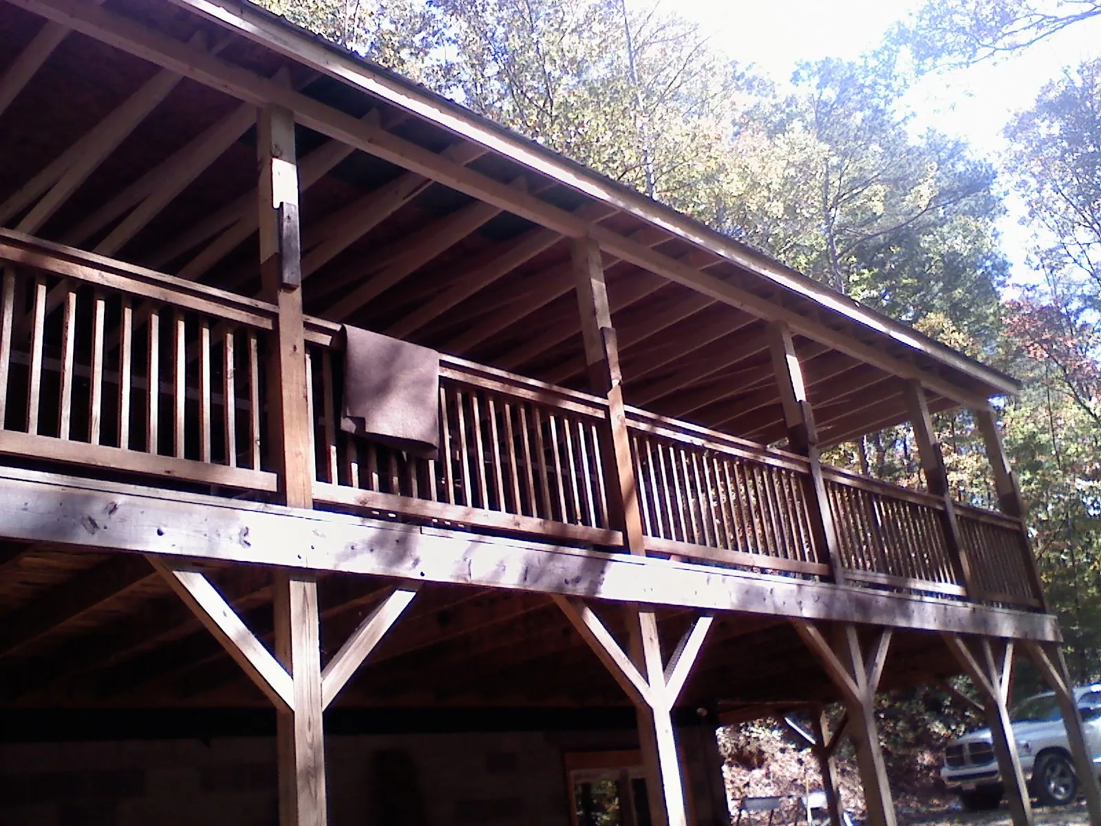 Timber framing under a new elevated porch and deck — Roof Leak Repair in Kirkersville by Roofing Brothers